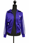 Jachetă sport Adidas mov, mărime S, cu fermoar integral și guler tip tunică